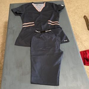 Grey’s Anatomy charcoal gray scrub set. Size small. Like new condition.